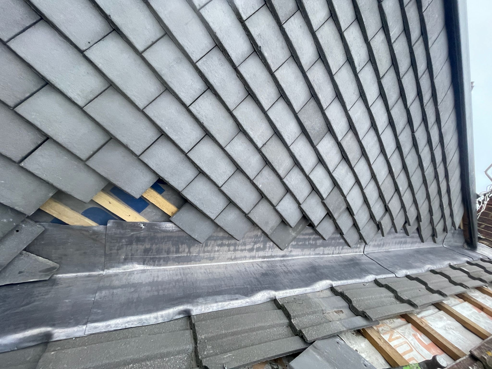 Slate Roof with Lead Step Flashing